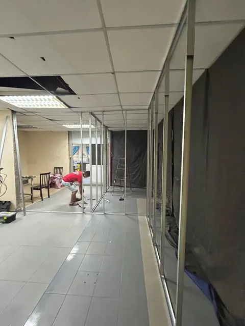 Cement-board partition work in progress.