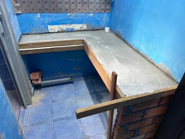 Washbasin counter construction in progress.