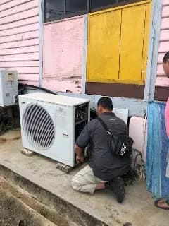 Outdoor air-conditioning unit maintenance at AADK Segamat.