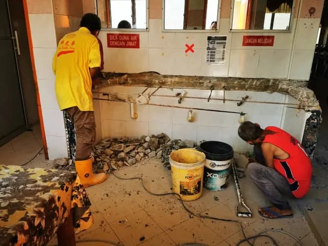 Washbasin counter work at the hostel.