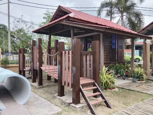 Outdoor play structure and access steps.