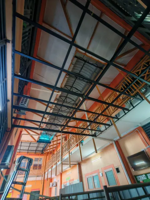 Exposed framework above the pharmacy counter.