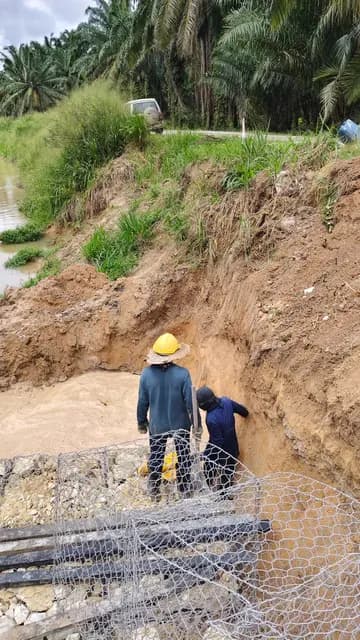 Gabion construction at the riverbank.