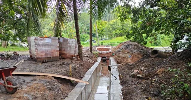 Drainage channel and brickwork.